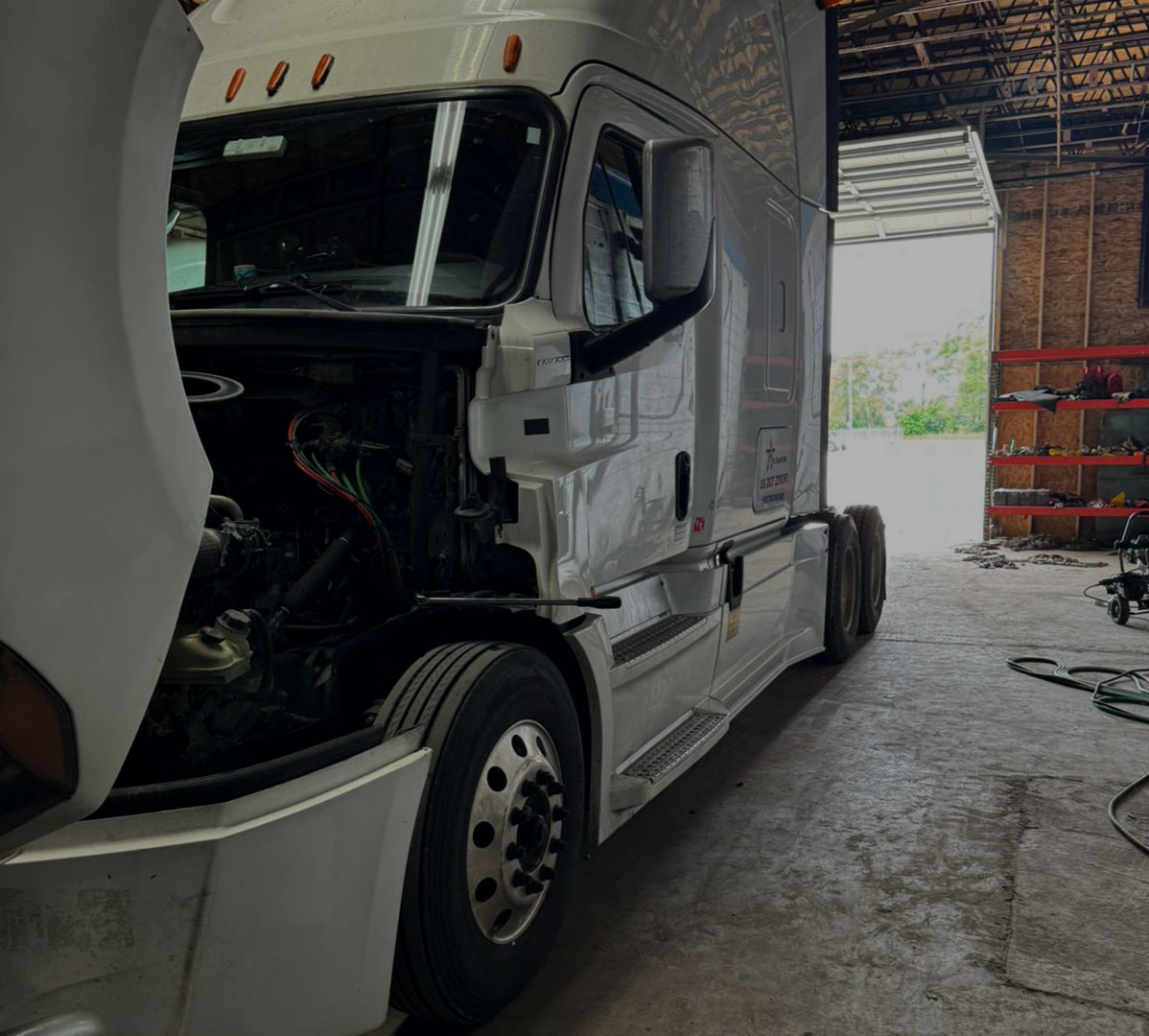 Truck undergoing repair at TA Trans Repair Shop